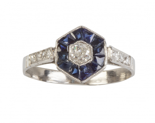 Sortija de frente hexagonal con brillante central de 0,18 c