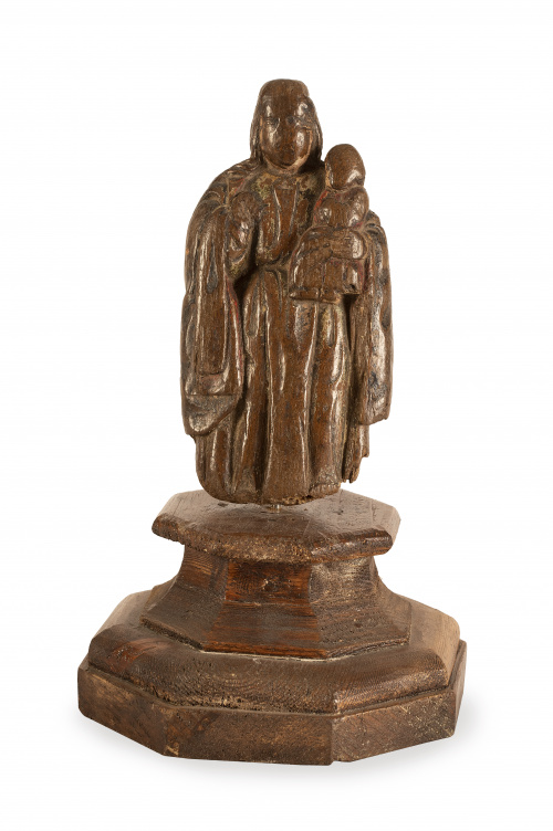 Virgen con el Niño .Escultura en madera tallada sobre pea