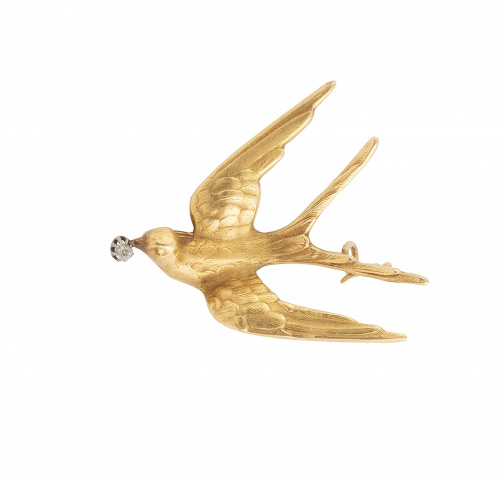 Broche de pp. S. XX en forma de golondrina con brillante en