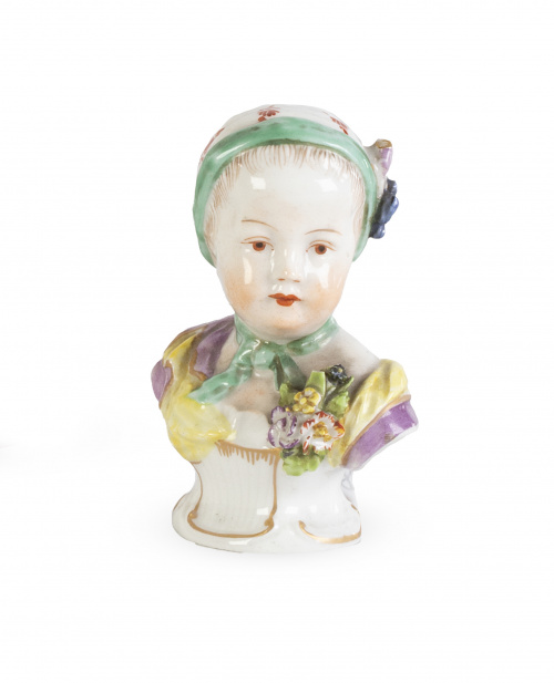 Busto de niña de porcelana esmaltada y dorada. Marcada en l