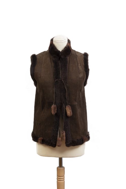 Chaleco de piel vuelta de nutria con borlas en cordones de 