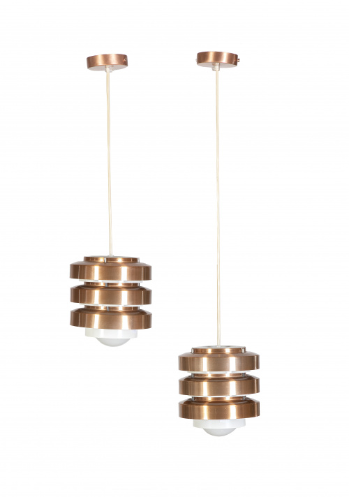 Pareja de lámparas de diseño de metal en tono cobrizo.S. 