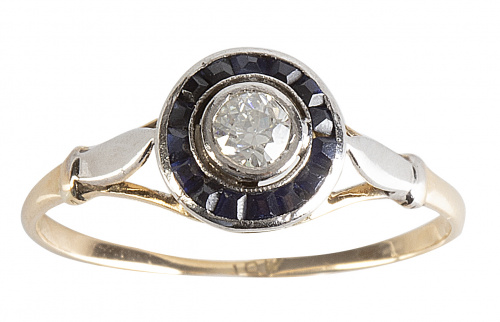 Sortija ojo de perdiz con brillante de 0,20 ct aprox orlado