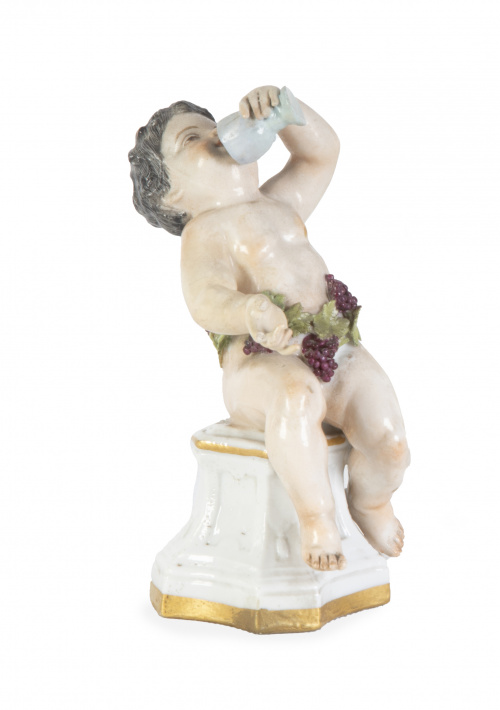 Baco.Figura de porcelana esmaltada y dorada. S. XIX.