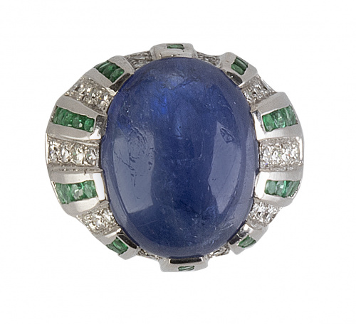 Sortija bombée con gran zafiro oval central de 17,60 ct, ro