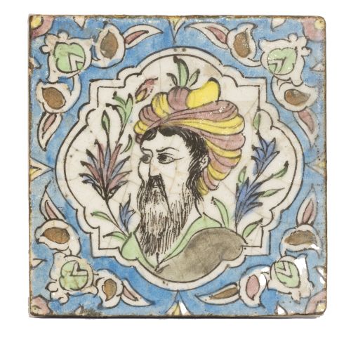 Azulejo de cerámica esmaltada con personje en cartela.Per