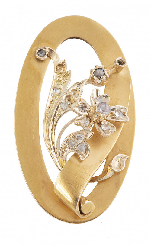 Broche oval S. XIX con flor de diamantes rodeada por cinta 