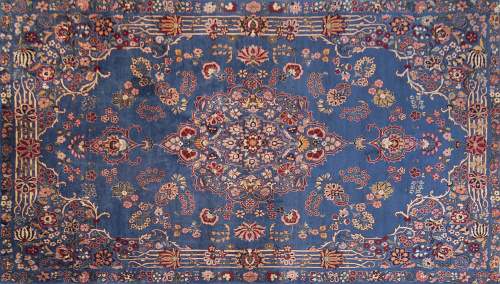 Alfombra de campo azul y decoración floral. Persia.