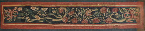 Fragmento de cenefa de tapiz con flores.S. XVII - XVIII.