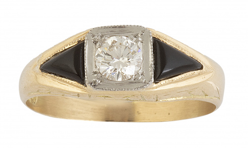 Sortija años 30 con brillante flanqueado por dos piezas de 