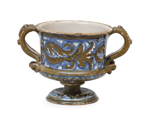 Copa ("Copa su piede") en azul y reflejo metálico.Italia,