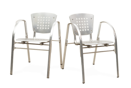 Pareja de sillas tipo Toledo de metal cromado.Siguiendo a