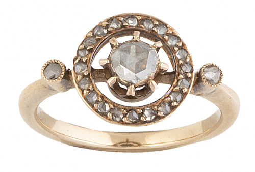 Sortija c.1890 con diamante central rodeado por círculo de 