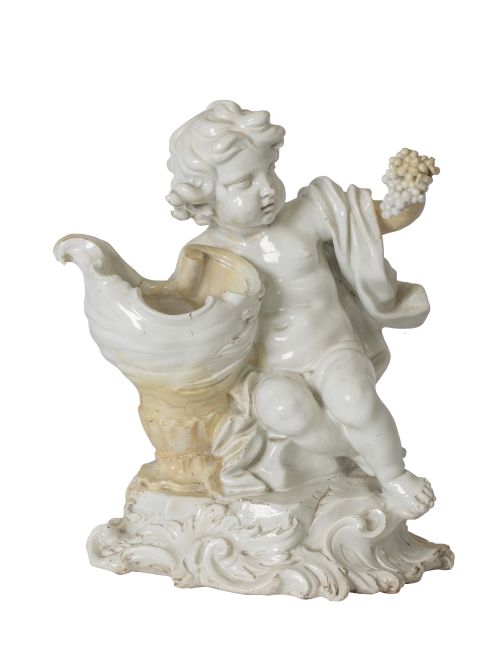 Alegoría del otoño.Figura escúltorica de porcelana tierna