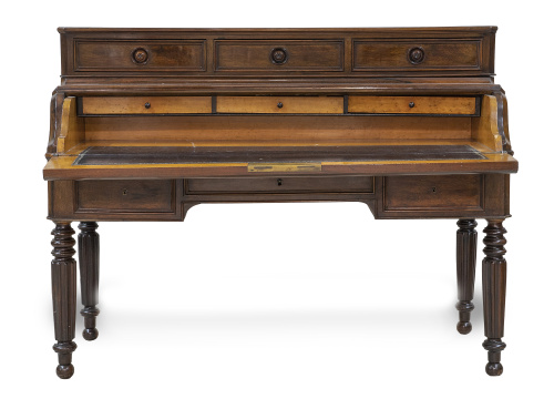 Bureau de cilindro de madera de palosanto.Francia, mediad