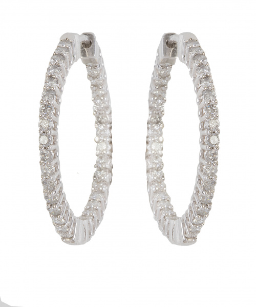 Pendientes criollas con brillantes en el frente, en montura