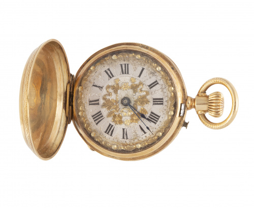 Reloj saboneta S. XIX en oro de 18K y esmalte negro. Numera