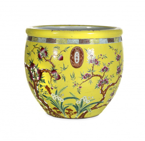 Pecera en porcelana amarilla con decoración de ramas de mel