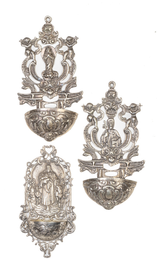 Lote de tres benditeras de plata calada: una con Santiago A