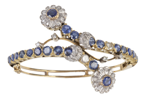Brazalete rígido c. 1930 de zafiros y brillantes con dos ma