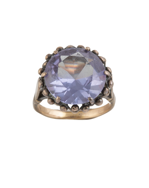 Sortija S.XIX con piedra morada circular central en marco d