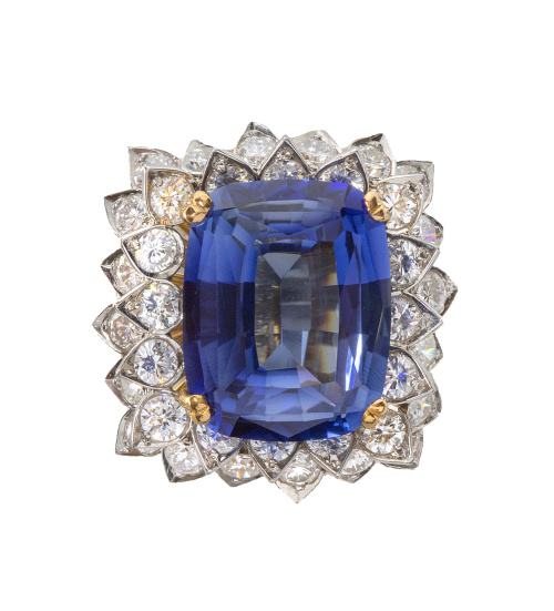 Sortija flor con con gran zafiro sintético central enmarcad
