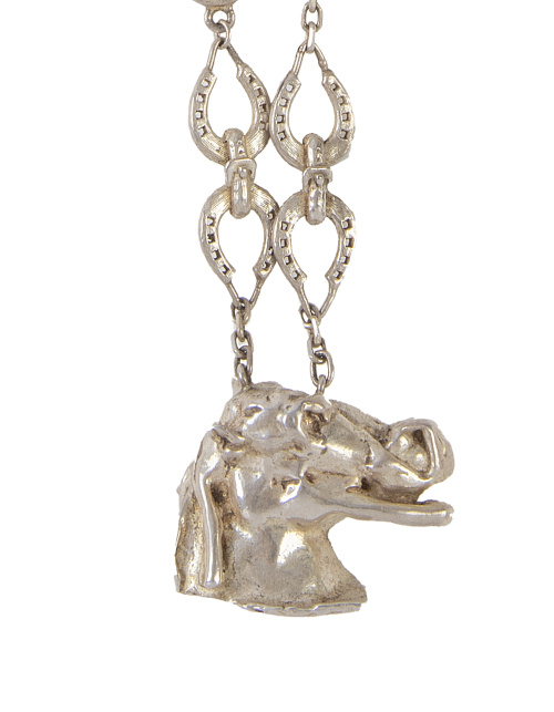 Conjunto de pendientes y colgante DALI con cabezas de cabal