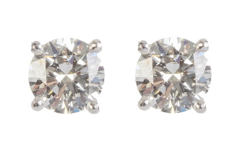 Pendientes dormilona con solitarios de brillantes engastado