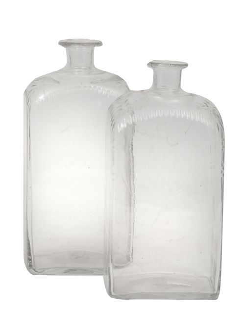 Pareja de frascas de vidrio transparente soplado a molde co