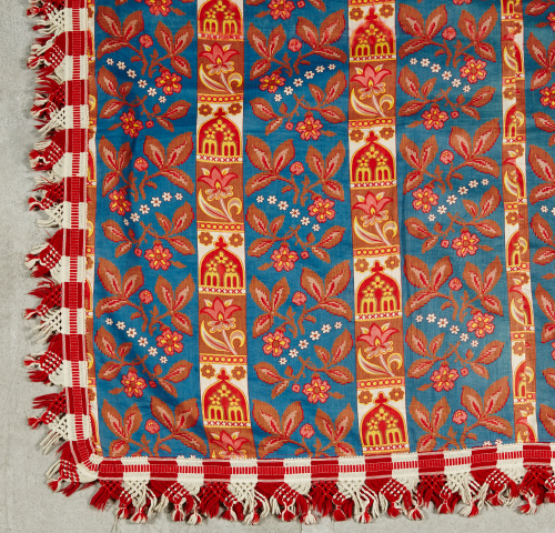 Tela de  “indiano” de algodón estampado con hojas y flores.