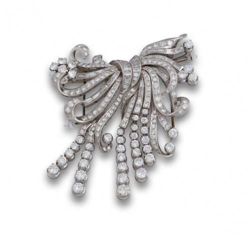 Elegante broche doble clip de platino ,brillantes y baguett