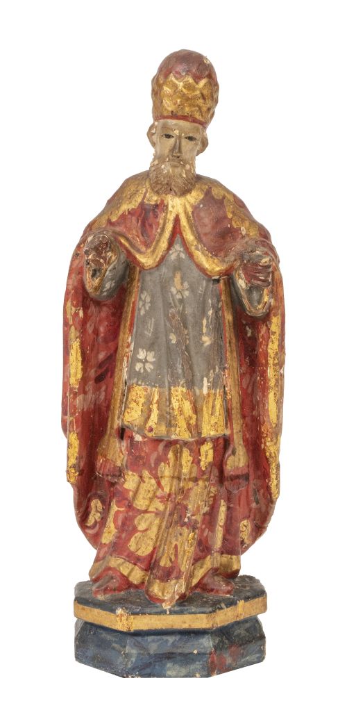 Santo de madera tallada, policromada y dorada.Trabajo col