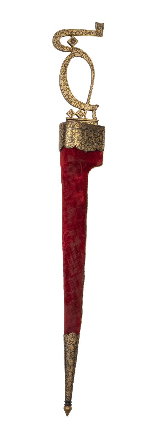 Daga damasquinada en oro con empuñadura de forma caligráfic