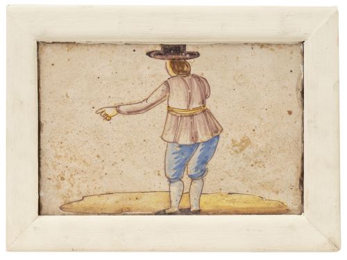 Azulejo de cerámica esmaltada con personaje de espaldas.L