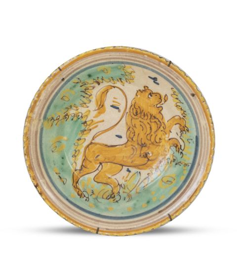 Plato de cerámica esmaltada con león.Puente del Arzobispo