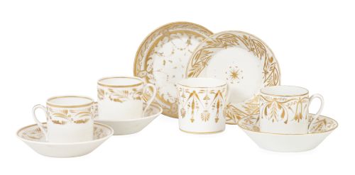 Juego de cuatro tazas imperio con sus platos de porcelana e