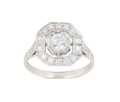 Sortija con brillante central de 0,46 ct aprox, orlada de b