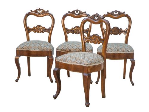 Juego de cuatro sillas de madera de nogal, con copete y res