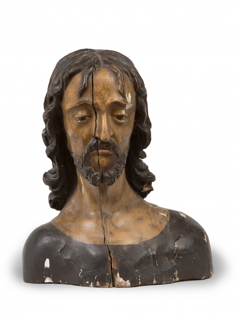 Cabeza de santo.Escultura en madera tallada y policromada